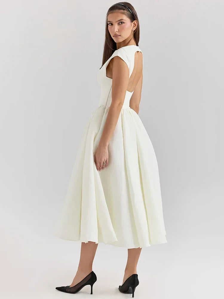 Elegant Dress with Cape Sleeve and Open Back