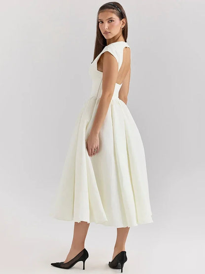 Elegant Dress with Cape Sleeve and Open Back
