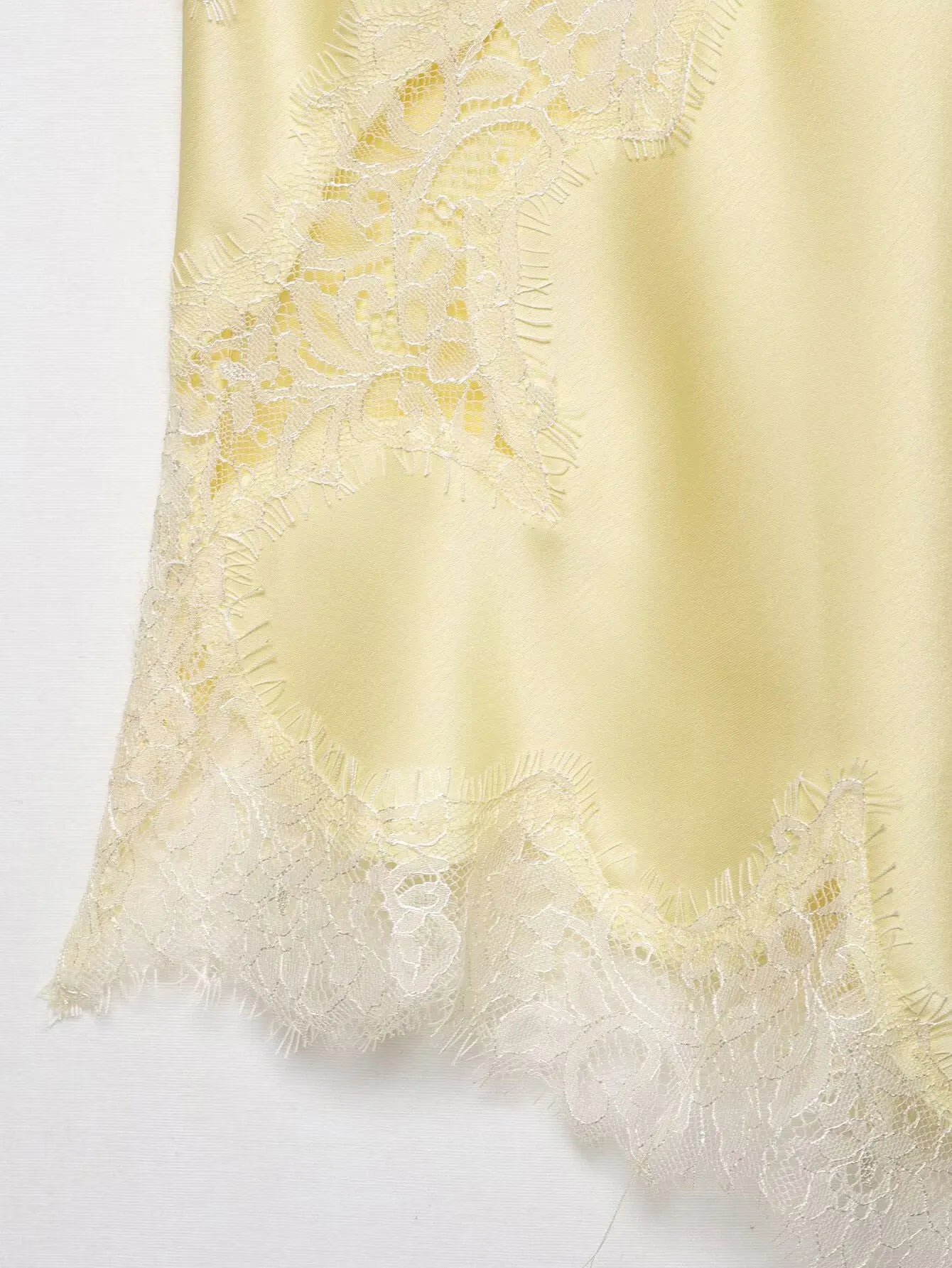 Lace-paneled camisole tops