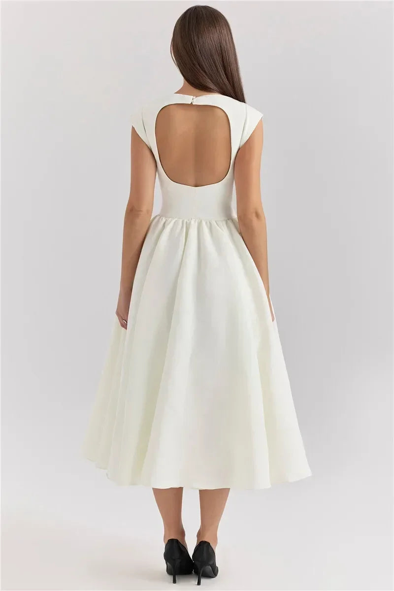 Elegant Dress with Cape Sleeve and Open Back