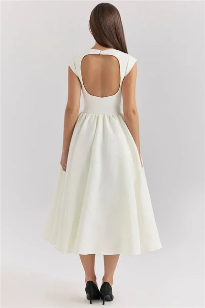 Elegant Dress with Cape Sleeve and Open Back
