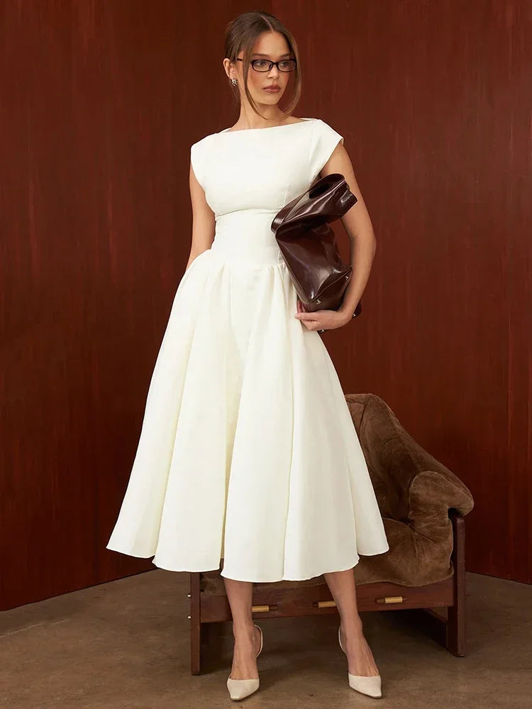 Elegant Dress with Cape Sleeve and Open Back