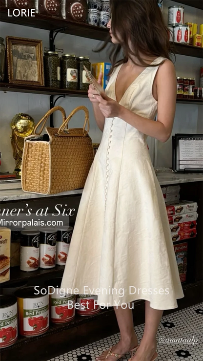 vestidos de novia con botones y cuello en V