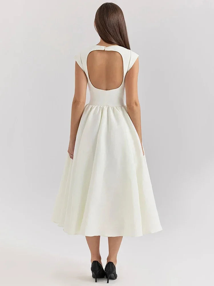 Elegant Dress with Cape Sleeve and Open Back