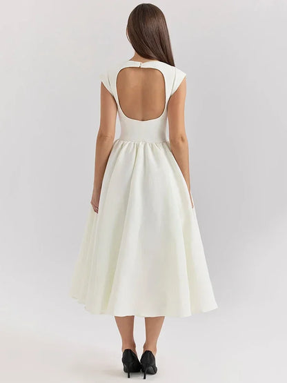 Elegant Dress with Cape Sleeve and Open Back