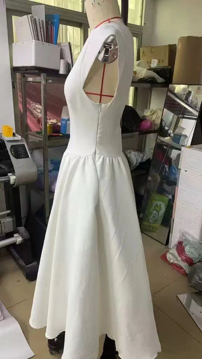 Elegant Dress with Cape Sleeve and Open Back