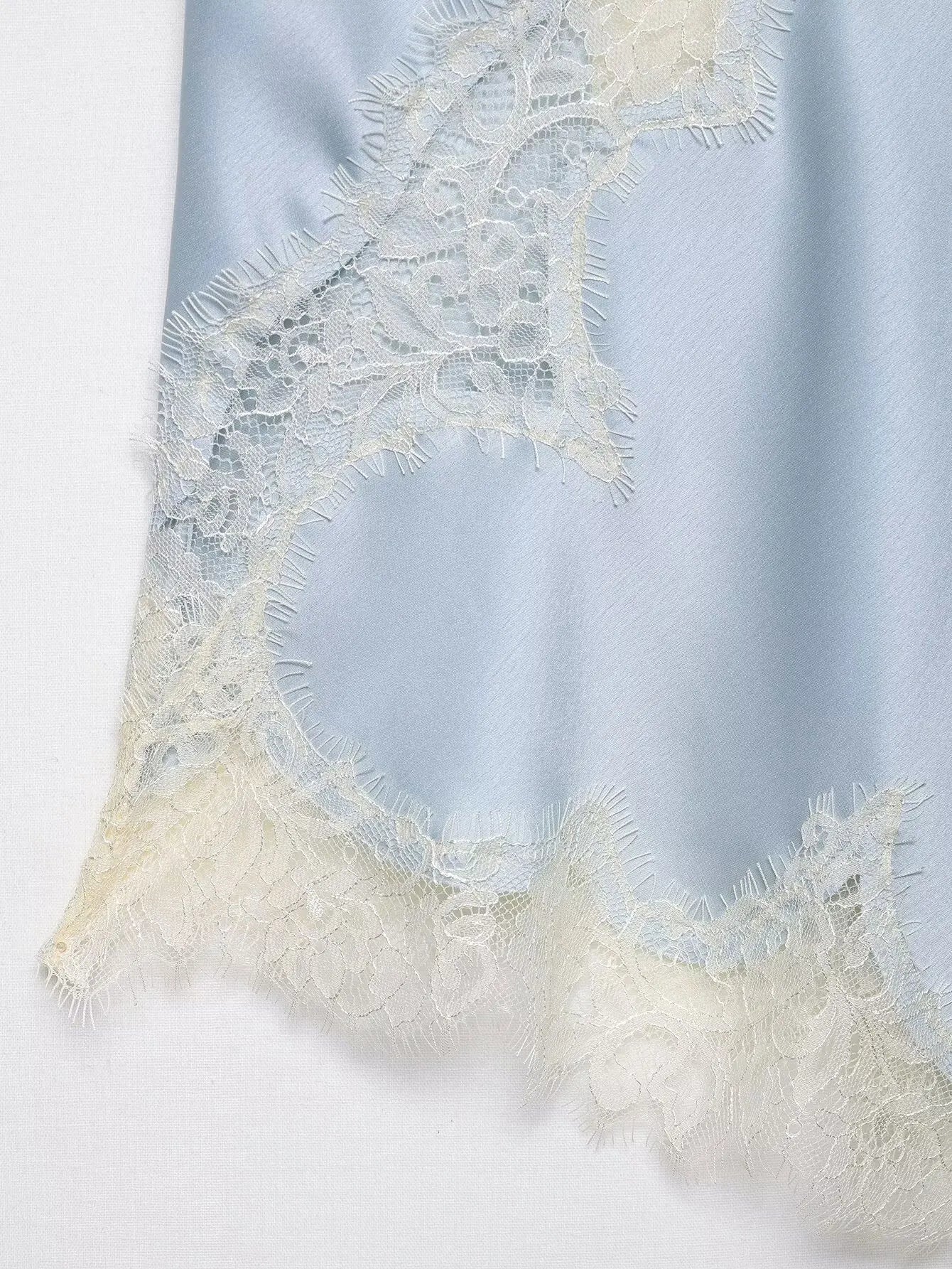 Lace-paneled camisole tops
