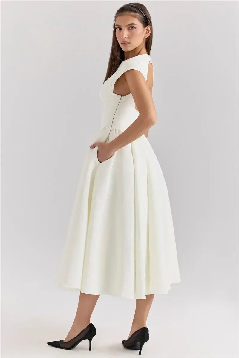 Elegant Dress with Cape Sleeve and Open Back